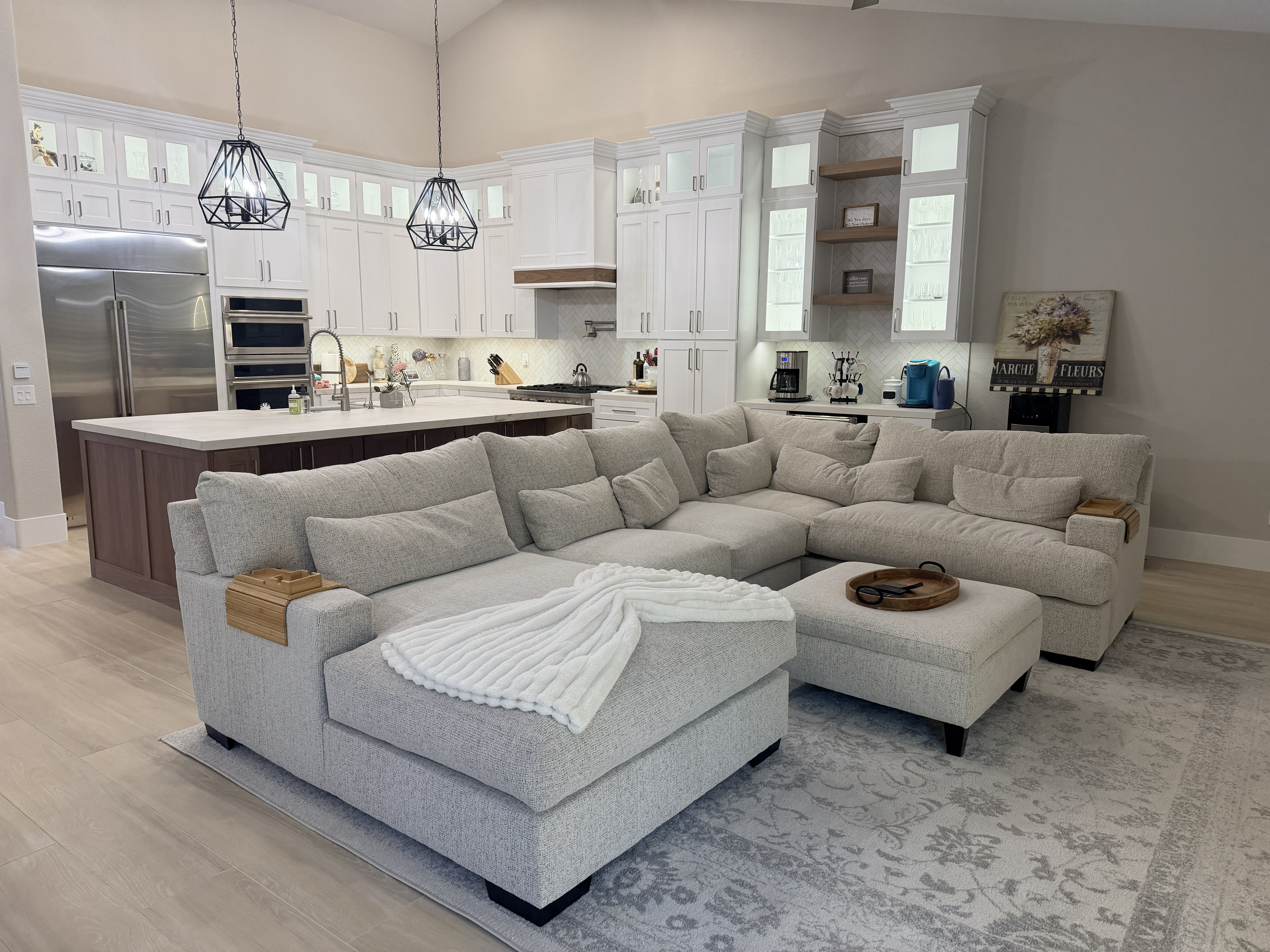 Contemporary white kitchen with marble island